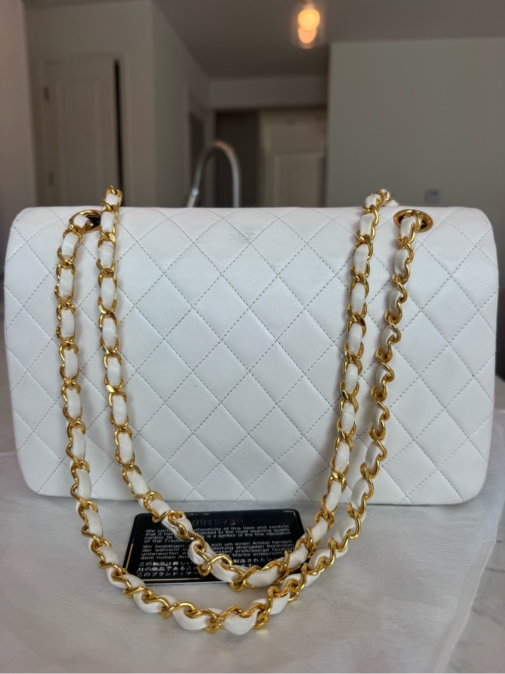 Chanel Vintage Classic Flap Bag | White Lambskin | 24K Gold Hardware, AUTHENTIC - Picture 16 of 17